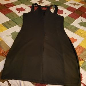 Black sleek dress with gold neck piece